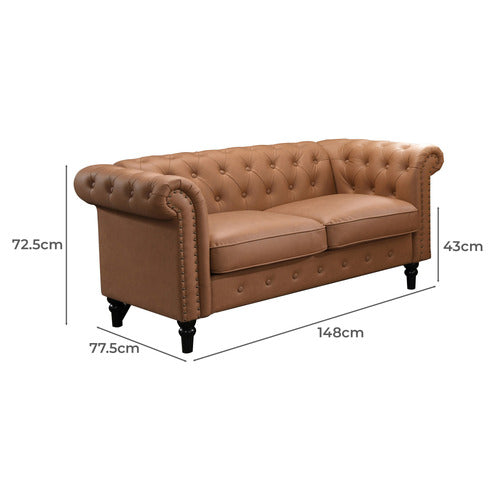 BY DESIGNS CORNELIA CHESTERFIELD 2 SEATER FAUX LEATHER SOFA