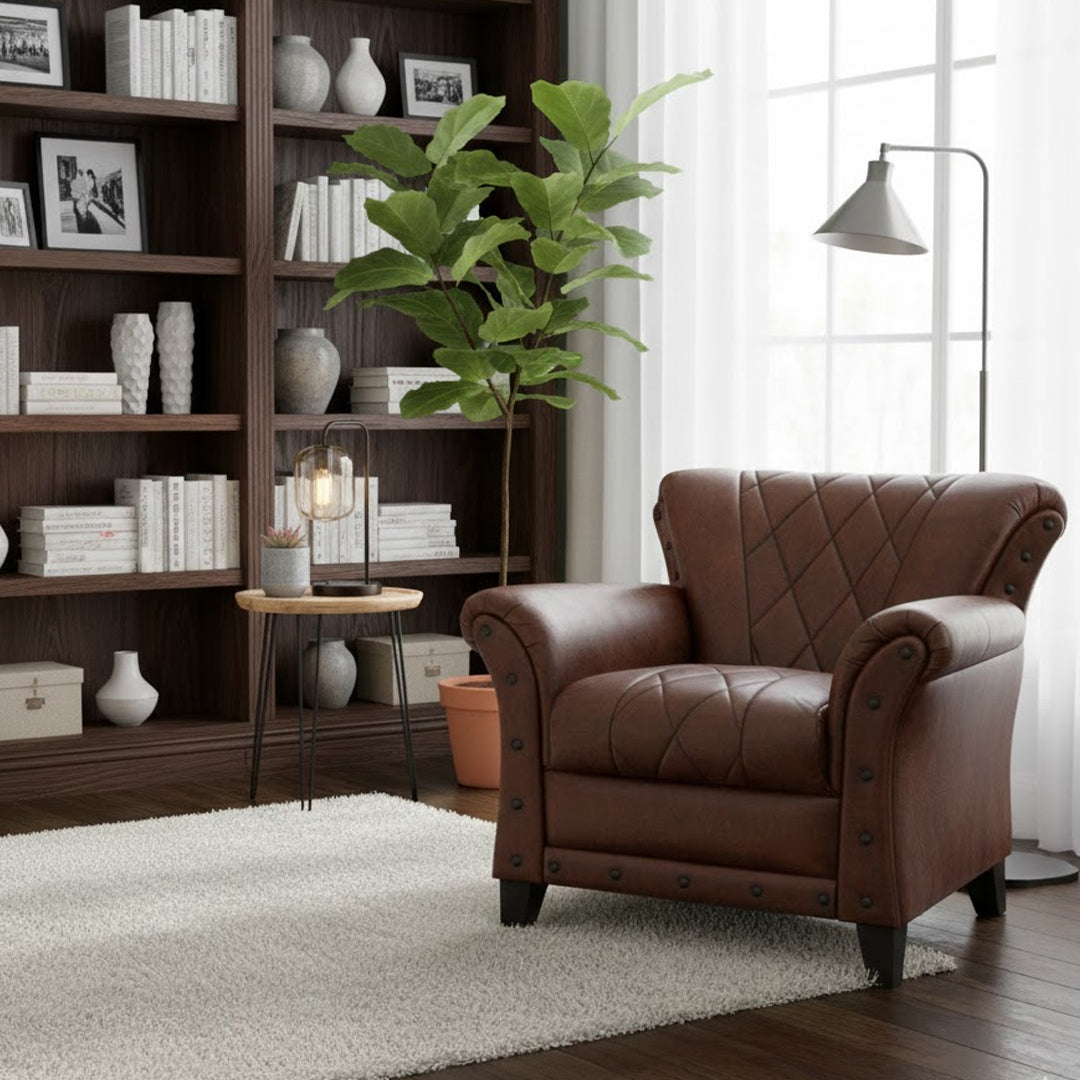 THE DECOR STORE STUDDED LEATHER ARM CHAIR