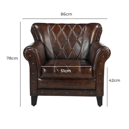 THE DECOR STORE STUDDED LEATHER ARM CHAIR