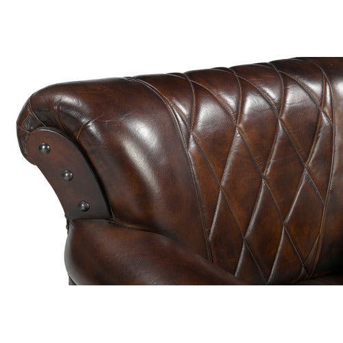 THE DECOR STORE STUDDED LEATHER ARM CHAIR